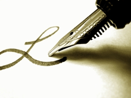 Fountain pen writing an italic L